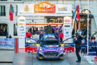 Loeb celebrating January's Monte Carlo win with co-driver...